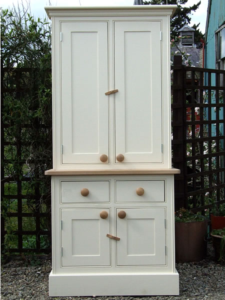 small kitchen dresser with a full height top cupboard