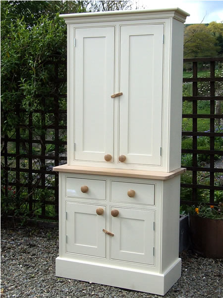 small kitchen dresser painted in cream &amp; fitted with a waxed pine worktop