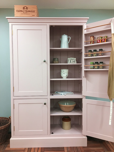 freestanding larder cupboard in pink with 4 panelled doors