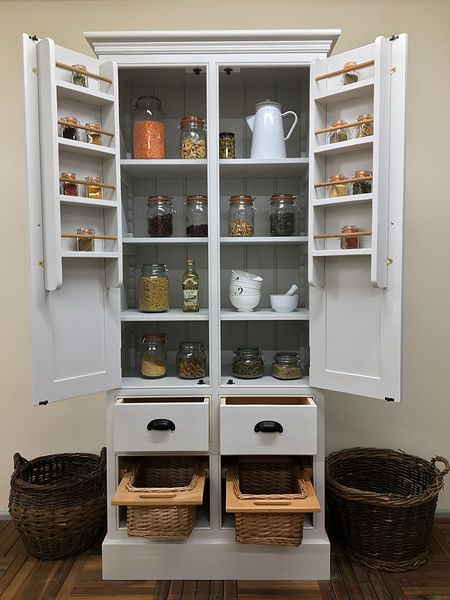 freestanding larder cupboard incorporating pull-out wicker baskets and dovetailed wooden drawers