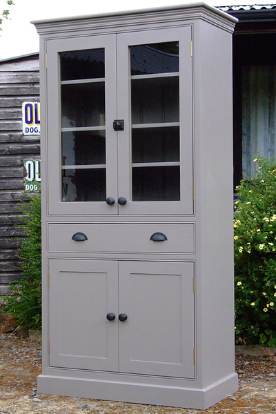 freestanding larder cupboard with glazed door top with fully adjustable shelves