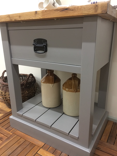 freestanding butcher's trolley fitted with a painted slatted shelf