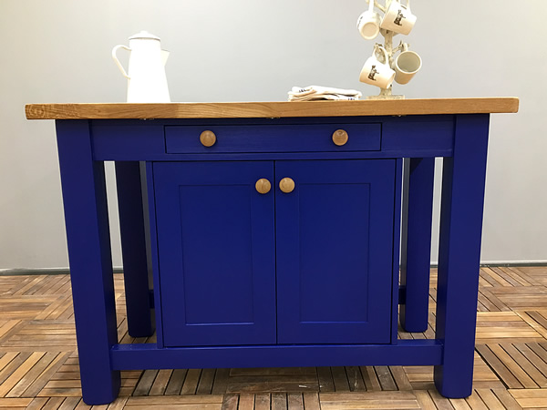 small freestanding kitchen island with double storage cupboard