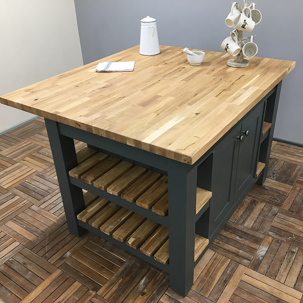 medium sized freestanding kitchen island finished in farrow and ball downpipe estate eggshell with solid oak worktop