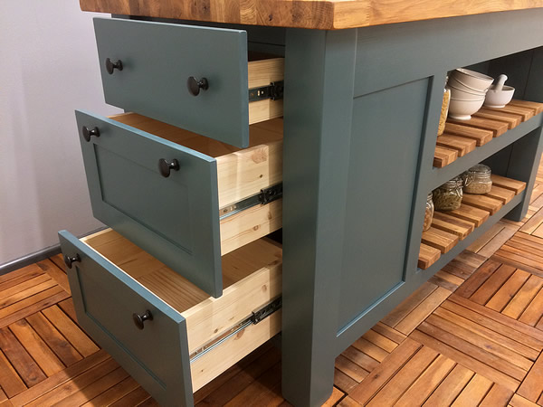 large freestanding kitchen island with large end drawers fitted with soft-close runners