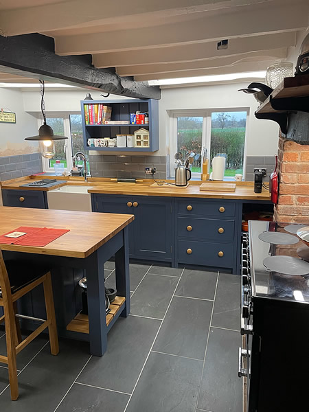 bespoke fitted kitchen hand-painted in dulux breton blue eggshell